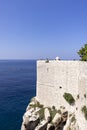 View of Old Walls with one of towers, surrounding medieval city on the Adriatic Sea, Dubrovnik, Croatia Royalty Free Stock Photo