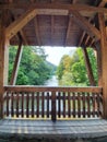 View from a old wood bridge at a small river Royalty Free Stock Photo