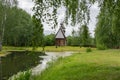 View of the old wooden houses in the park of Russian art in Kostroma, photo was taken on a cloudy summer day Royalty Free Stock Photo