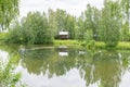 View of the old wooden houses in the park of Russian art in Kostroma, photo was taken on a cloudy summer day Royalty Free Stock Photo