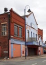 A view of oldham road in ashton under lyne showing the derelict tameside hippodrome theatre