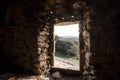 View through door of Troglodyte house at Ostriconi in Corsica Royalty Free Stock Photo