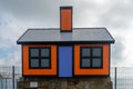 View of one of the colorful Richard Woods cartoon bungalows in Folkestone