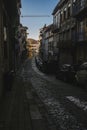 A view of the one of the narrow streets in the old town of Porto, Portugal. Royalty Free Stock Photo