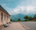 View from one of the railway stations of the Swiss railway. Far away mountains in clouds and haze