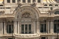 View onto the balcony on the facade of the Palacio de Bellas Artes Palace of Fine Arts with its many details, stucco and Royalty Free Stock Photo