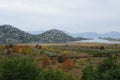 View onto the river and hills near Ploce in mist