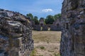 A view through an opeing into the haunted ruins of Grace Dieu Priory in Leicestershire, UK Royalty Free Stock Photo