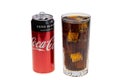 View of open cocs can and soda with ice in crystal glass. Drink concept.