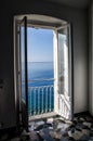 View through an open door of the sea sunny day. Royalty Free Stock Photo