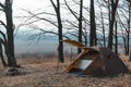 View of a open tourist tent with a quick-build system, brown. no people. place for text. Dull dark tones of autumn morning, winter Royalty Free Stock Photo