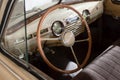 View on opened window with the steering wheel and the interior of the old Russian retro vintage car of the executive class Royalty Free Stock Photo