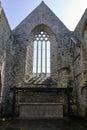 View of an openwork window and of a sarcophagus in Sligo Abbey, in the county of the same name, Ireland