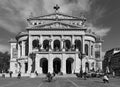 View of the opera oquare and the reconstructed house alte oper, or old opera, frankfurt am main, germany in black and white