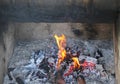 WOOD FIRE WITH ASHES, EMBERS AND FLAMES Royalty Free Stock Photo