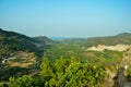 View of orange plantations on the Mediterranean coast of Spain between the mountains. On the horizon the Mediterranean Sea Royalty Free Stock Photo