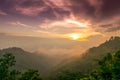 View Orange purple Sunset shine on sky and and mountain in evening time at Samoeng Forest Viewpoint chiangmai , thailand Royalty Free Stock Photo