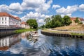 View of Oranienburg Castle with the banks of the river Havel in the foreground