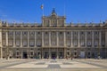 View of the ornate architecture of the Royal Palace or Palacio Real facade and Plaza de la Armeria in Madrid, Spain