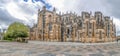 View of the ornate Gothic exterior facade of the Monastery of Batalha, Mosteiro da Batalha