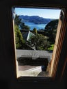 A view on Otago peninsula from a window at Larnach Castle's tower in the afternoon Royalty Free Stock Photo