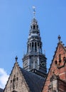 Oude Kerk (Old Church) in Amsterdam, Netherlands against blue sky Royalty Free Stock Photo