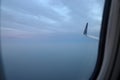 View out of airplane window with wing Royalty Free Stock Photo