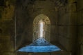 A view out of a defensive opening in the ruins of the crusader castle in Shobak, Jordan Royalty Free Stock Photo