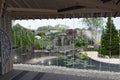 View out the gazebo to patio cascade waterfall features, 3D render Royalty Free Stock Photo