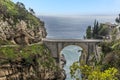 The view out to sea past the arched bridge at Fiordo di Furore on the Amalfi Coast, Italy Royalty Free Stock Photo