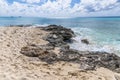 A view out to sea from a rocky headland on the shoreline of the island of Grand Turk Royalty Free Stock Photo