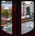 View out of the window of a moving train. You see a section of the Spree river in Berlin Royalty Free Stock Photo