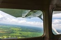 View out of the window of small airplane in flight Royalty Free Stock Photo