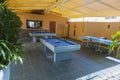 View of outdoor place for playing table tennis for hotel guests. Royalty Free Stock Photo