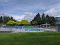 Kirkland, WA USA - circa June 2020: View of an outdoor public pool, closed down during coronavirus in downtown Kirkland