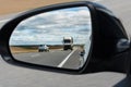 View of the outside car rearview mirror Royalty Free Stock Photo