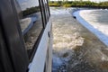 View outside window of offroad truck driving the Ivanhoe Crossing, Kununurra, Western Australia, Australia. A concrete causeway Royalty Free Stock Photo