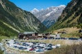 View over Alpensporthotel Mutterberg and parking ground of Stubai cable cars in Tyrol, Austria