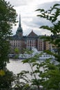 Colorful historic skyline stockholm through trees Royalty Free Stock Photo