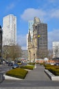 View over the Berlin boulevard `Tauentzien` to historic `Kaiser-Wilhelm-Memorial-Church`, skyscrapers in the background