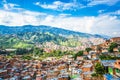 View over buildings and valley of Comuna 13 in Medellin, Colombia