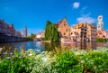 View over canal at the medieval city of Brugge in day light. Royalty Free Stock Photo