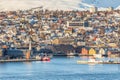 View over the city of Tromso and it`s marina in winter, North Norway Royalty Free Stock Photo