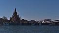 View over Danube River in Vienna, Austria with bridge ReichsbrÃÂ¼cke, St. Francis of Assisi Church and moored river cruise ship. Royalty Free Stock Photo