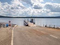 View over ferry metal boat against the wavy lake water Royalty Free Stock Photo