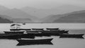 View over a few wooden boats on Phewa Lake, Pokhara Royalty Free Stock Photo