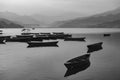 View over a few wooden boats on Phewa Lake, Pokhara Royalty Free Stock Photo