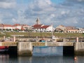 View over fishing harbor in Povoa de Varzim, Portugal towards Lapa Church