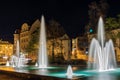 Joliot Curie Square in the city of Halle Saale in Germany at night with a beautiful fountain