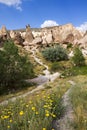 Volcanic rock formations known as fairy chimneys and extreme terrain of Cappadocia, Turkey Royalty Free Stock Photo